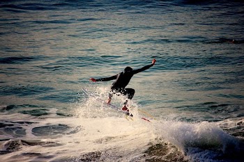 person wakeboarding on the sea