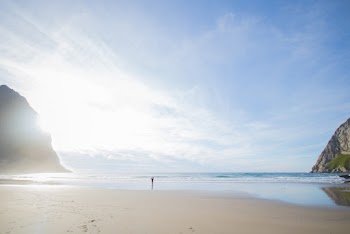 Person Walking at the Beach Seen Afar