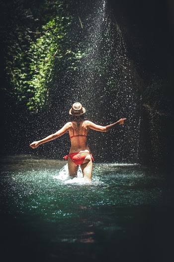 Person Walking in a Body of Water