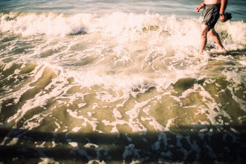 Person Walking in Seashore