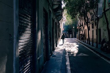 person walking near building at daytime