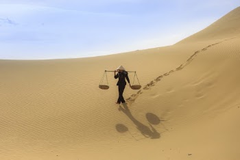 Person Walking On Desert
