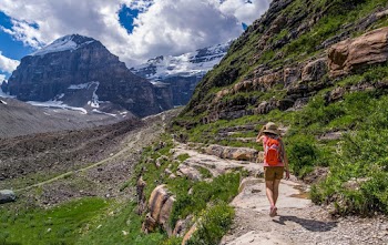 Person Walking on Mountain