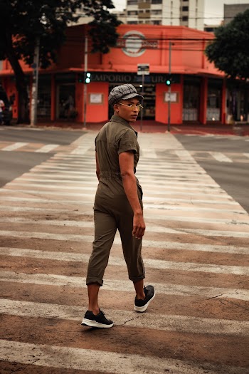 Person Walking on Pedestrian Lane