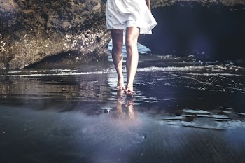 Person Walking On Sand