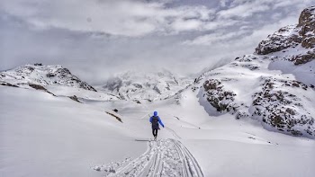 person walking on snowy mountain
