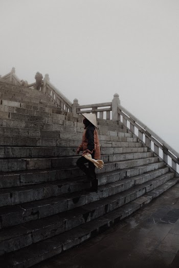 Person Walking on Stairs