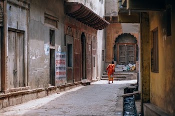 person walking on street during day time