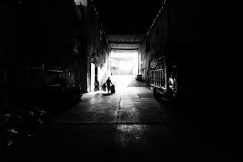 person walking on tunnel