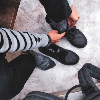 Person Wear Black Adidas Shoes