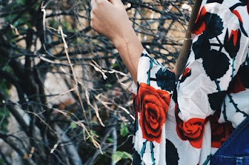 Person Wearing A Floral Top