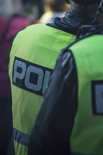 Person wearing a police uniform. | Free Photo - rawpixel