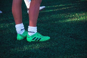 Person Wearing Adidas Cleats