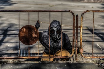Person Wearing Black Hoodie and Mask