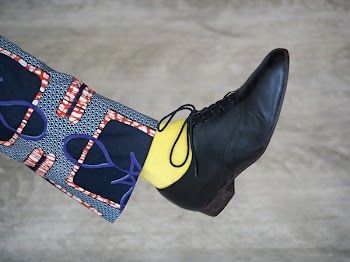 Person Wearing Black Leather Dres Shoe