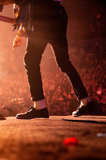 Person Wearing Black Pants at Concert