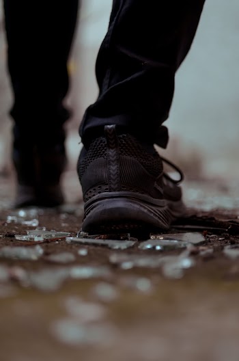 Person Wearing Black Shoes and Pants