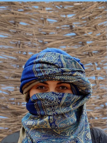Person Wearing Blue and Brown Hijab Veil