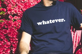 person wearing blue and white whatever-printed shirt