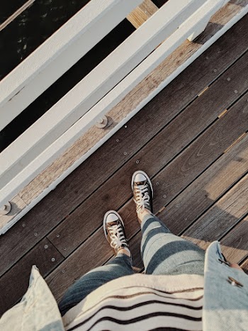 Person Wearing Blue Jeans Close-up Photography