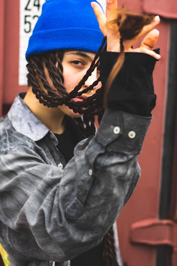 Person Wearing Blue Knit Cap