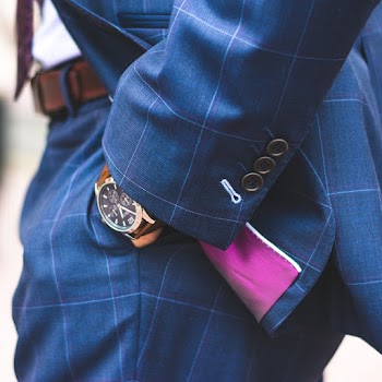 Person Wearing Blue Plaid Suit Jacket and Dress Pants