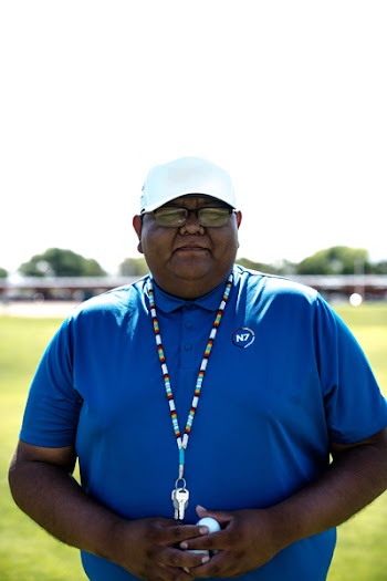 Person Wearing Blue Polo Shirt