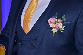 Person Wearing Blue Suit Jacket