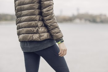 Person Wearing Brown Bubble Jacket