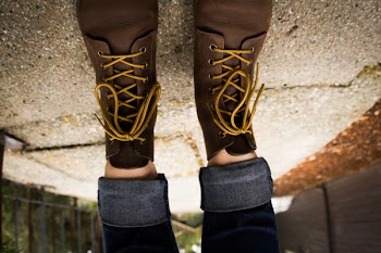 Person Wearing Brown Leather Lace-up Work Boots