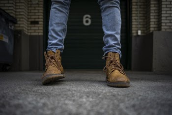 Person Wearing Brown Work Boots