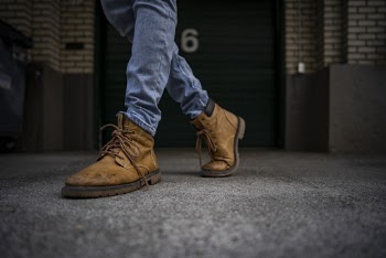 Person Wearing Brown Work Boots