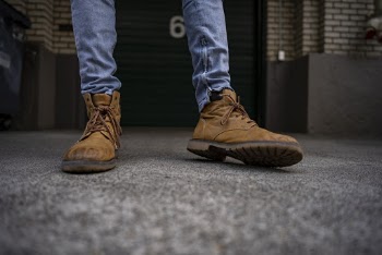 Person Wearing Brown Workboots