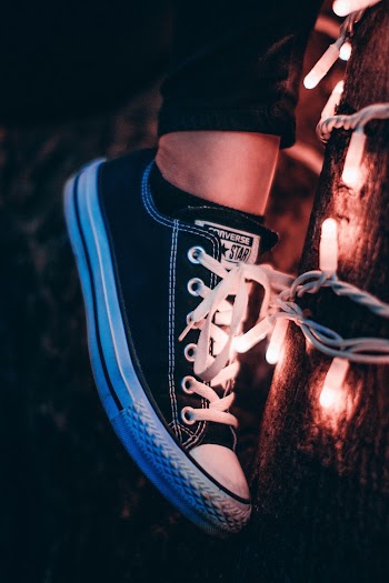 Person Wearing Converse All Star Sneakers