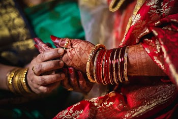 Person Wearing Gold-colored Bangle Lot
