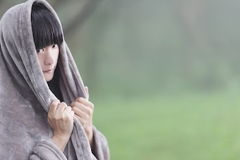 Person Wearing Gray Hoodie in Macro Lens Photography