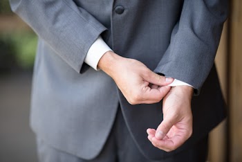 Person Wearing Gray Suit