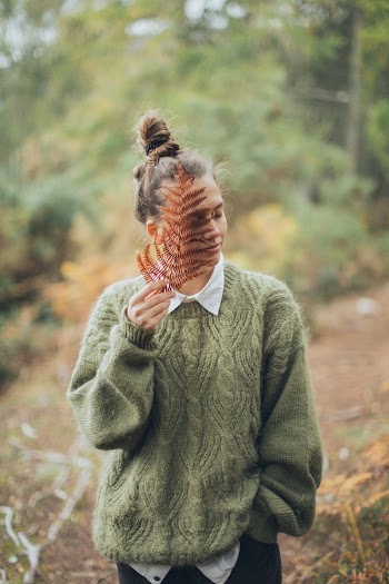 Person Wearing Green Sweatshirt
