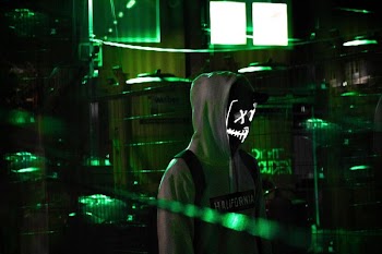 Person Wearing Grey Hoodie Jacket