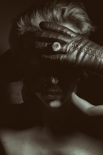 Person Wearing Leather Glove