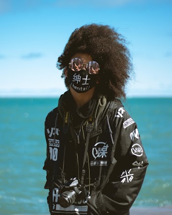 Person Wearing Mask And Jacket