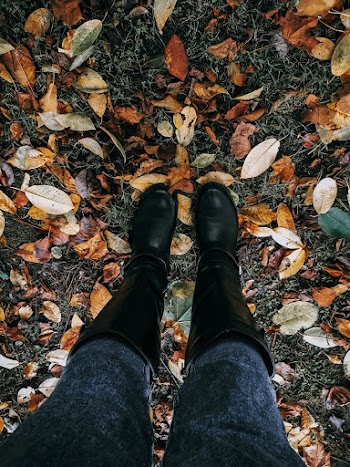 Person Wearing Pair Of Black Boots