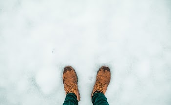 Person Wearing Pair of Brown Shoes