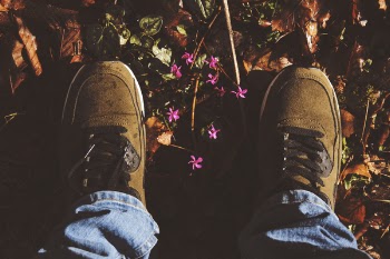 Person Wearing Pair Of Brown Suede Sneakers