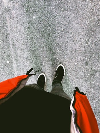 Person Wearing Pair of Sneakers