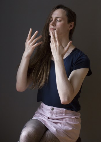 Person Wearing Pink Mini Skirt Sitting While Sitting on Stool