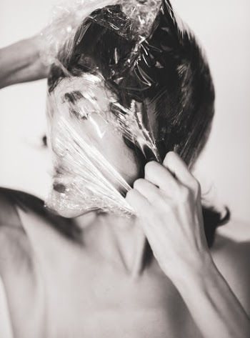 Person Wearing Plastic Bag on Head
