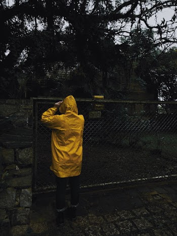 Person Wearing Rain Coat