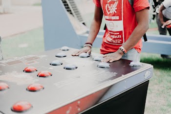 Person Wearing Red and White T-shirt