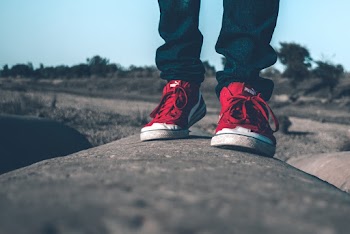 Person Wearing Red Shoes